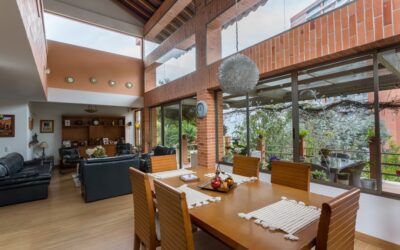 Two-Level Gated Community El Poblado Home With High Ceilings, Spacious Terrace, and Tropical Flora