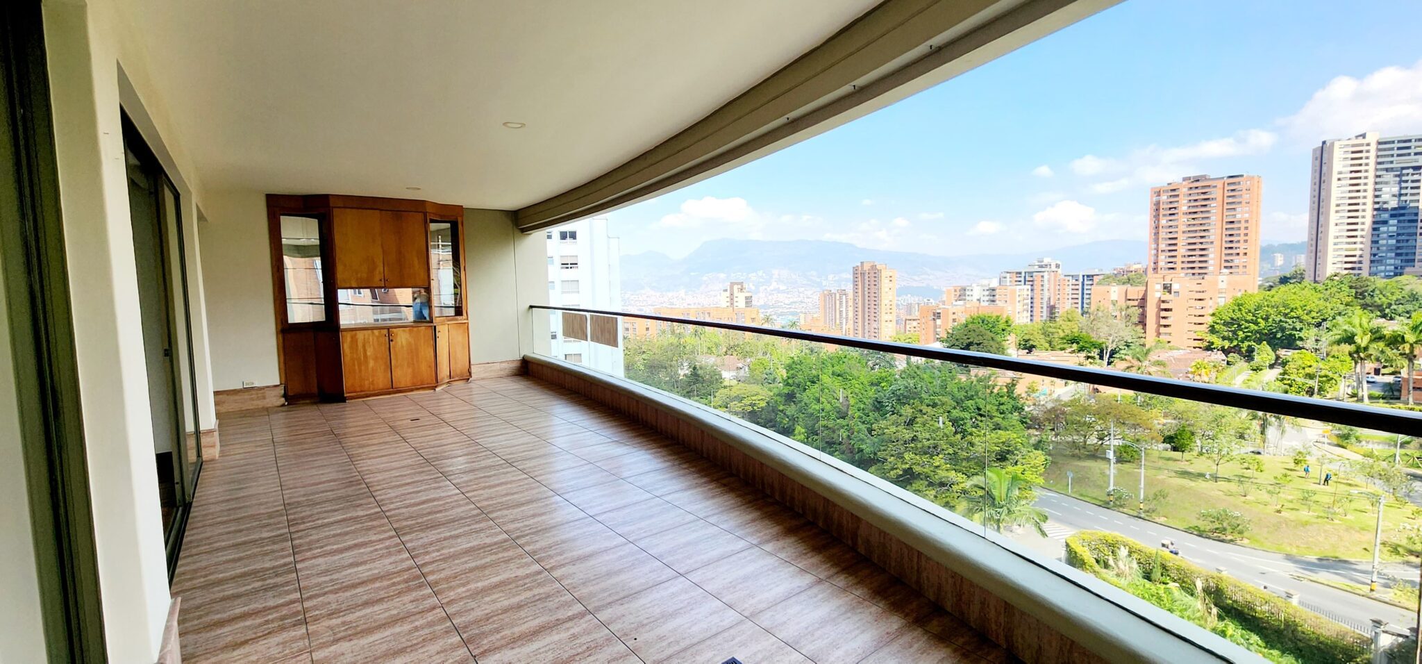 Large 4BR El Poblado Apartment With Hardwood Flooring, Panoramic Views, and Custom Library Space