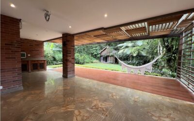 Two-Level El Poblado Gated Community Home With High Ceilings, Backyard Space, and Beautiful Hardwood and Marble Flooring
